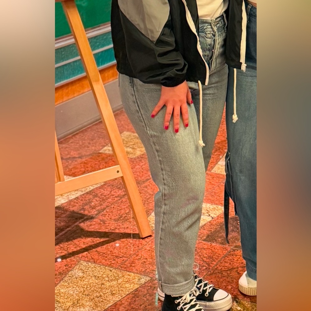 Black Jacket and Blue Jeans